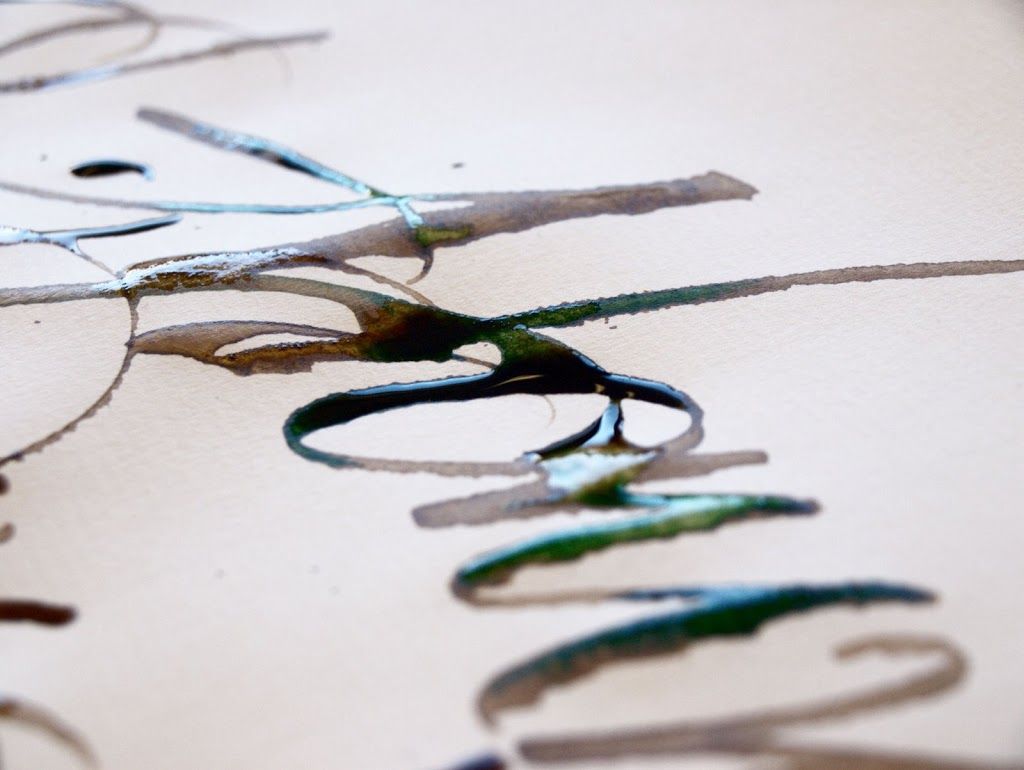 Líquido sobre papel. Caligrafía.